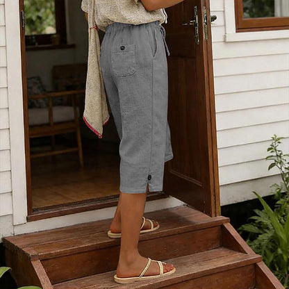 👖🌸 Avslappnade capribyxor med elastisk dragsko och fickor – komfort hela sommaren👖