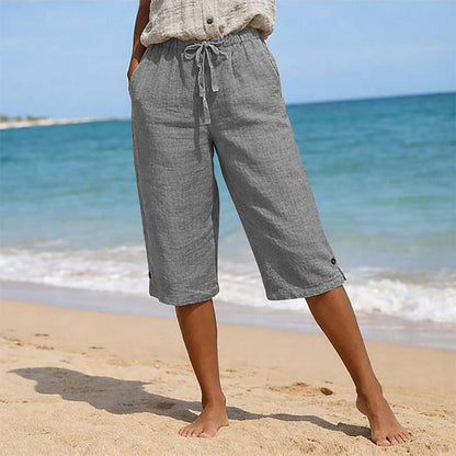 👖🌸 Avslappnade capribyxor med elastisk dragsko och fickor – komfort hela sommaren👖